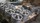 Close-up of cast iron handwheels with three spokes and raised hubs stacked on a workbench at ELCO Inc.